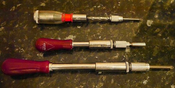 Wikipedia image of 3 complicated-looking long screwdrivers.
